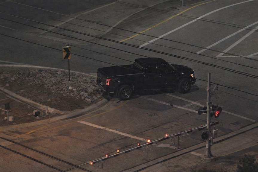 High-Speed Chase in Stolen Pickup Ends with Wild Fence Crash